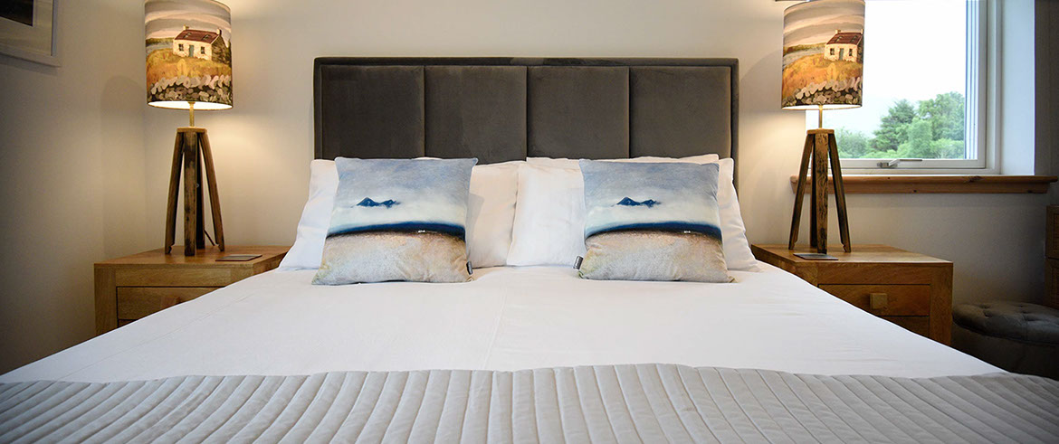 Taigh Scalpaigh bed and breakfast accommodation with comfortable king size bed and sea views of Portree Bay