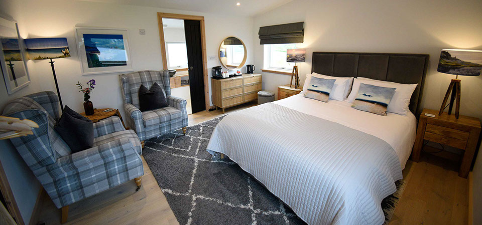 Taigh Scalpaigh King size double room with en suite shower room and sea views at our Portree bed and breakfast accommodation