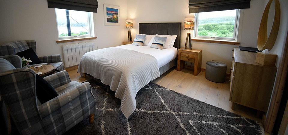 Taigh Scalpaigh is a bed and breakfast accommodation with king size double beds and sea views near Portree